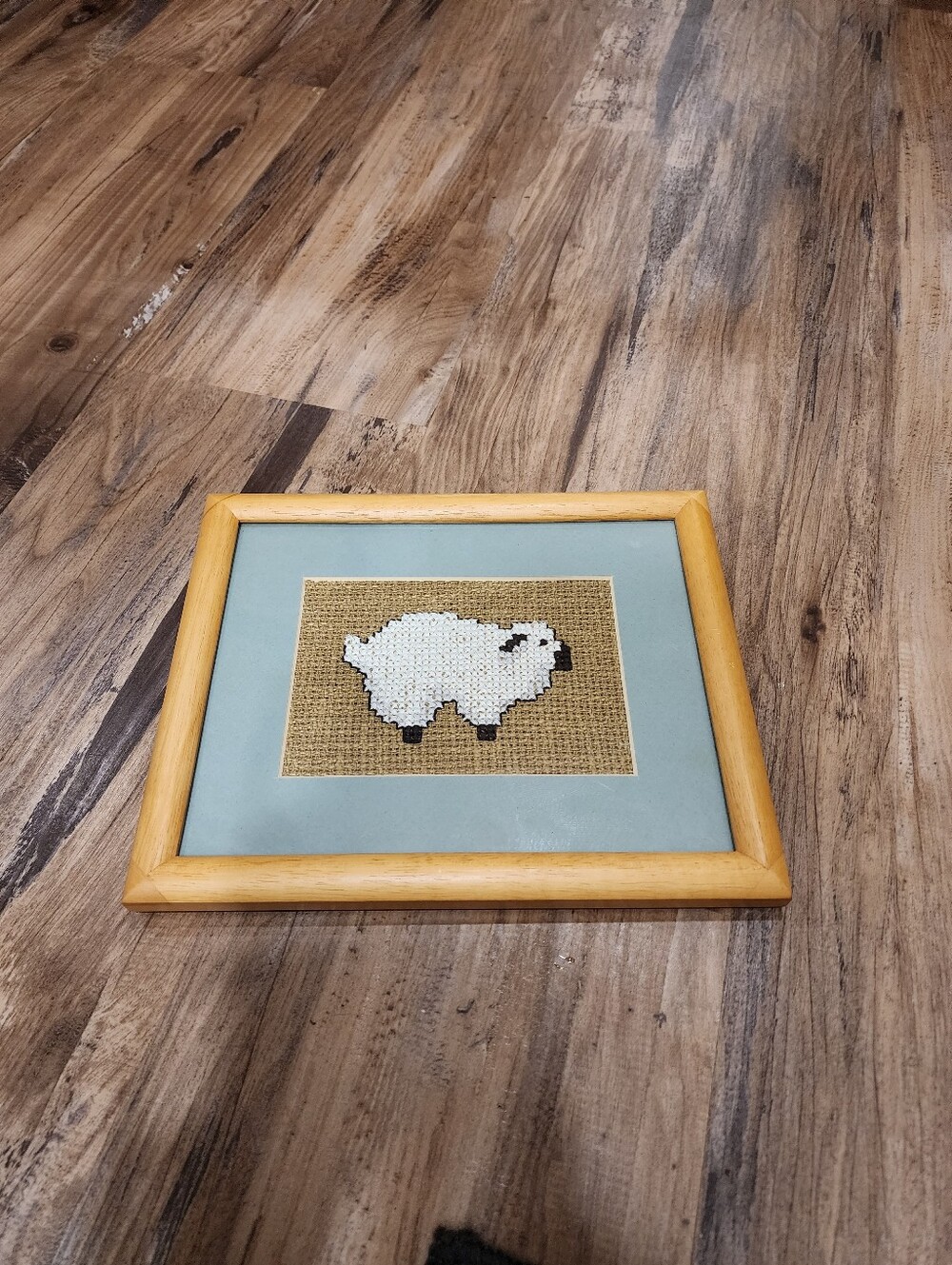 Handmade needpoint sheep in wood frame